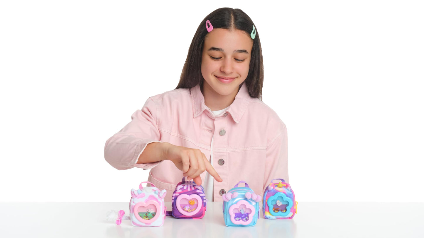 REAL LITTLES Liquid Charms, 1 Liquid Filled Micro-Sized Backpack with Window & Tiny Animal Charm Bobbing Inside, Reveal 6 Cute Tiny Animal Themed Stationery Surprises - Styles May Vary