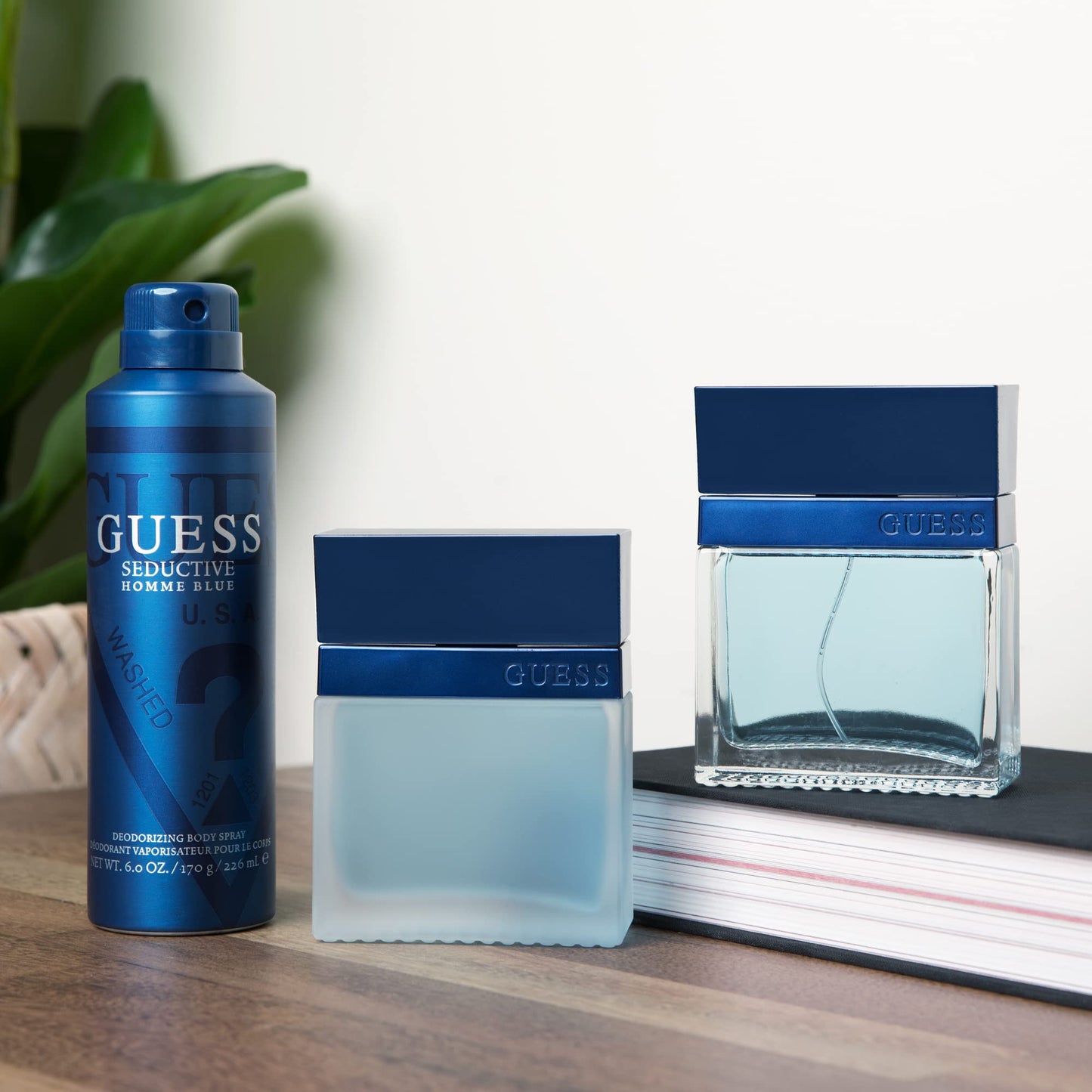 Guess Seductive Blue Men / Homme Eau de Toilette 4 Piece Gift Set - Cologne Spray 3.4 Fl. Oz., Deodorizing Body Spray 6.0 Oz., Shower Gel 3.4 Fl. Oz.