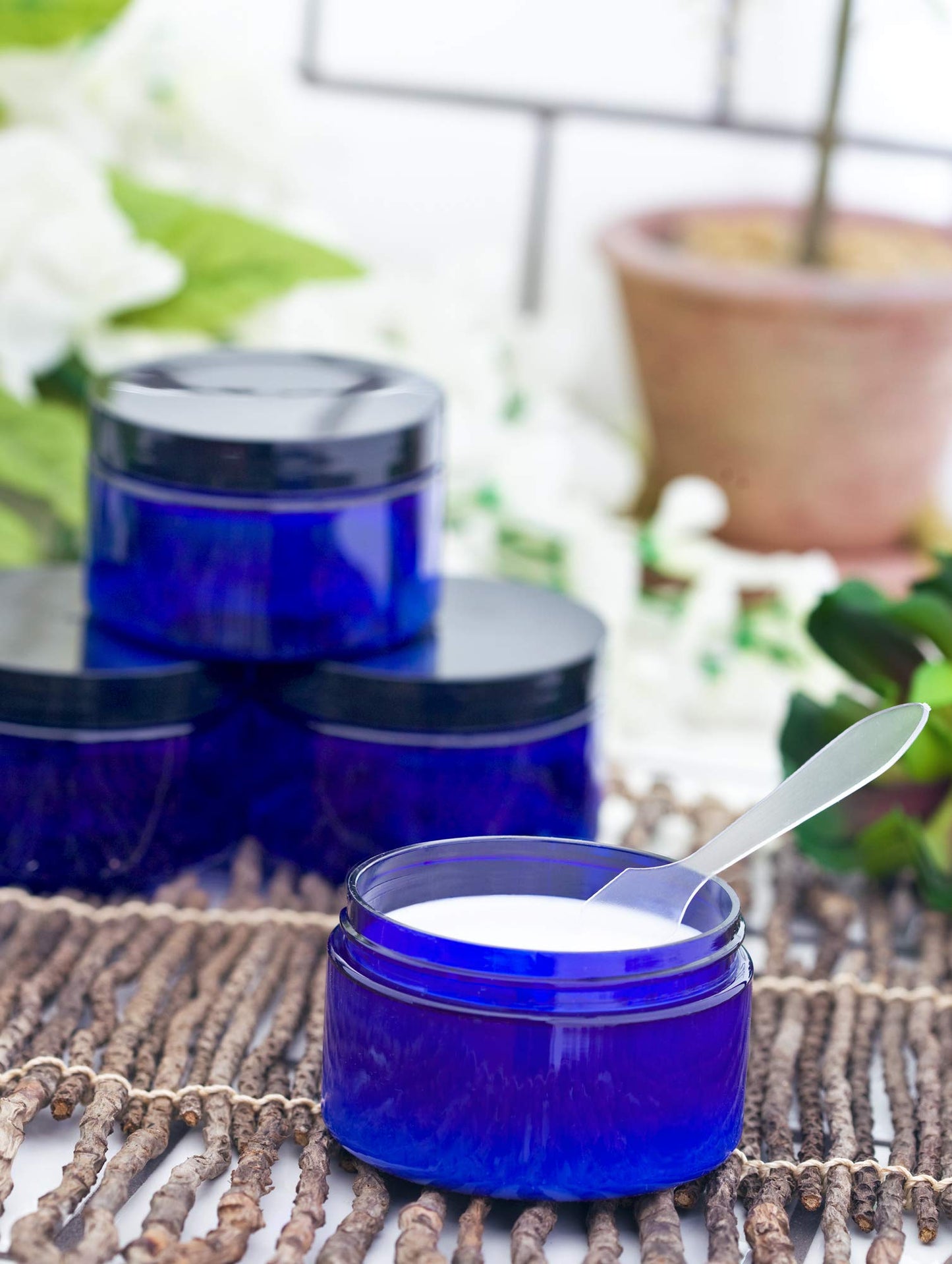 2 oz Cobalt Blue Heavy Wall Plastic Refillable Low Profile Jar with Black Lid (6 pack)