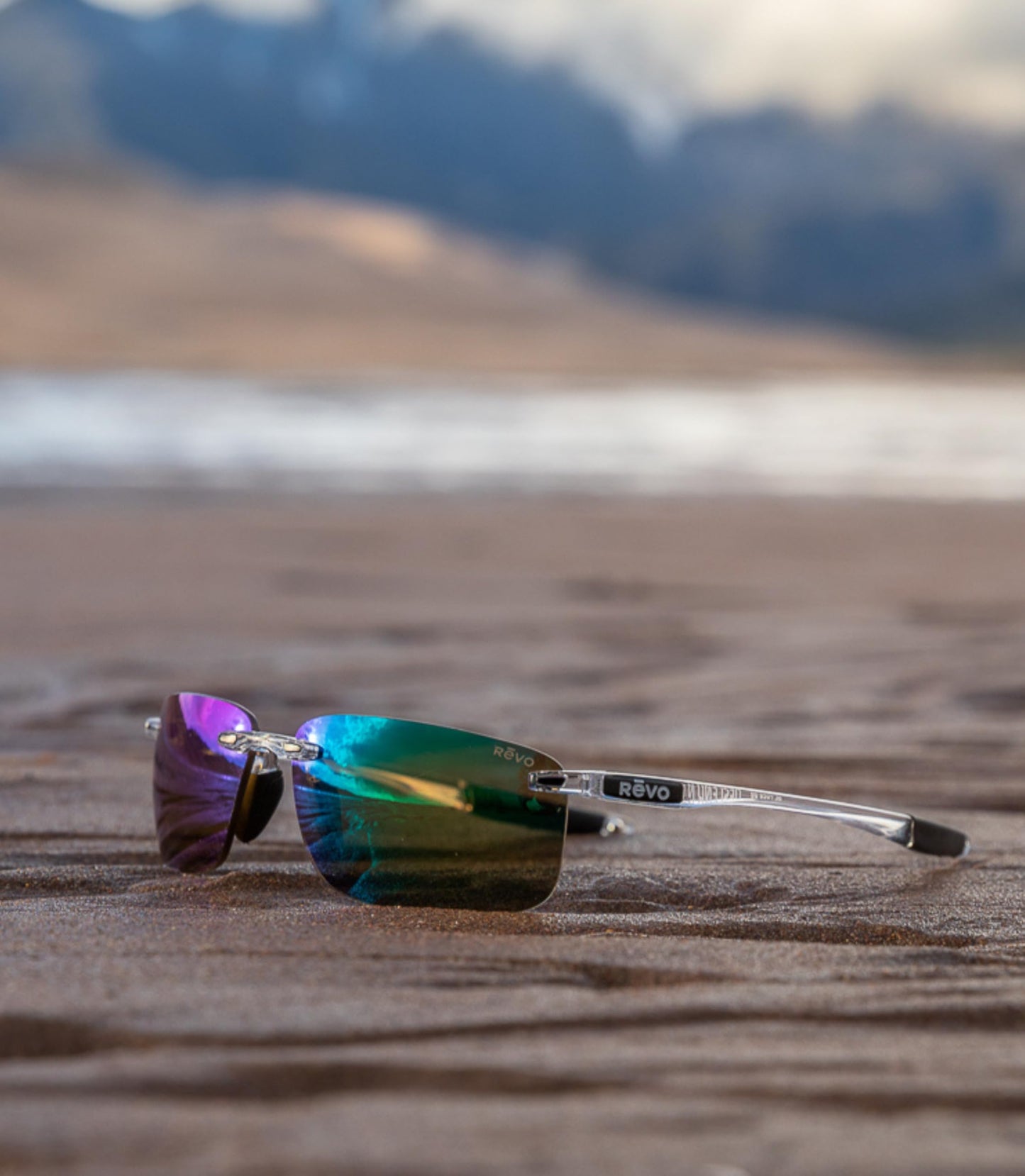 Revo Sunglasses Descend N: Polarized Lens Filters UV, Rimless Rectangle Frame, Crystal Frame with Blue Water Lens