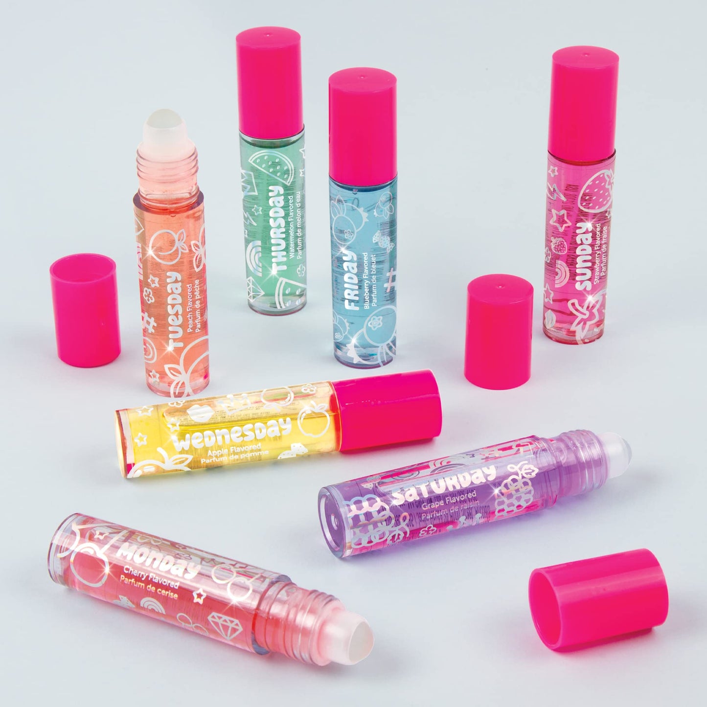 Make It Real 3C4G Days of the Week Lip Gloss Set - 7 Pack Kids Lip Gloss Kit - Clear Flavored Roll On Lip Gloss for Girls & Teens
