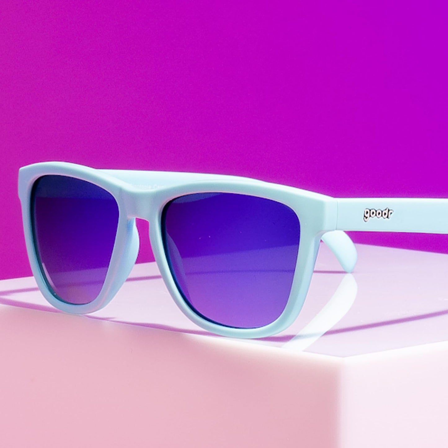 goodr Electric Dinotopia Carnival Polarized Sunglasses, Medium Sized (OG), Light Teal Solid Frames with Purple Mirrored Reflective Lens, UV400