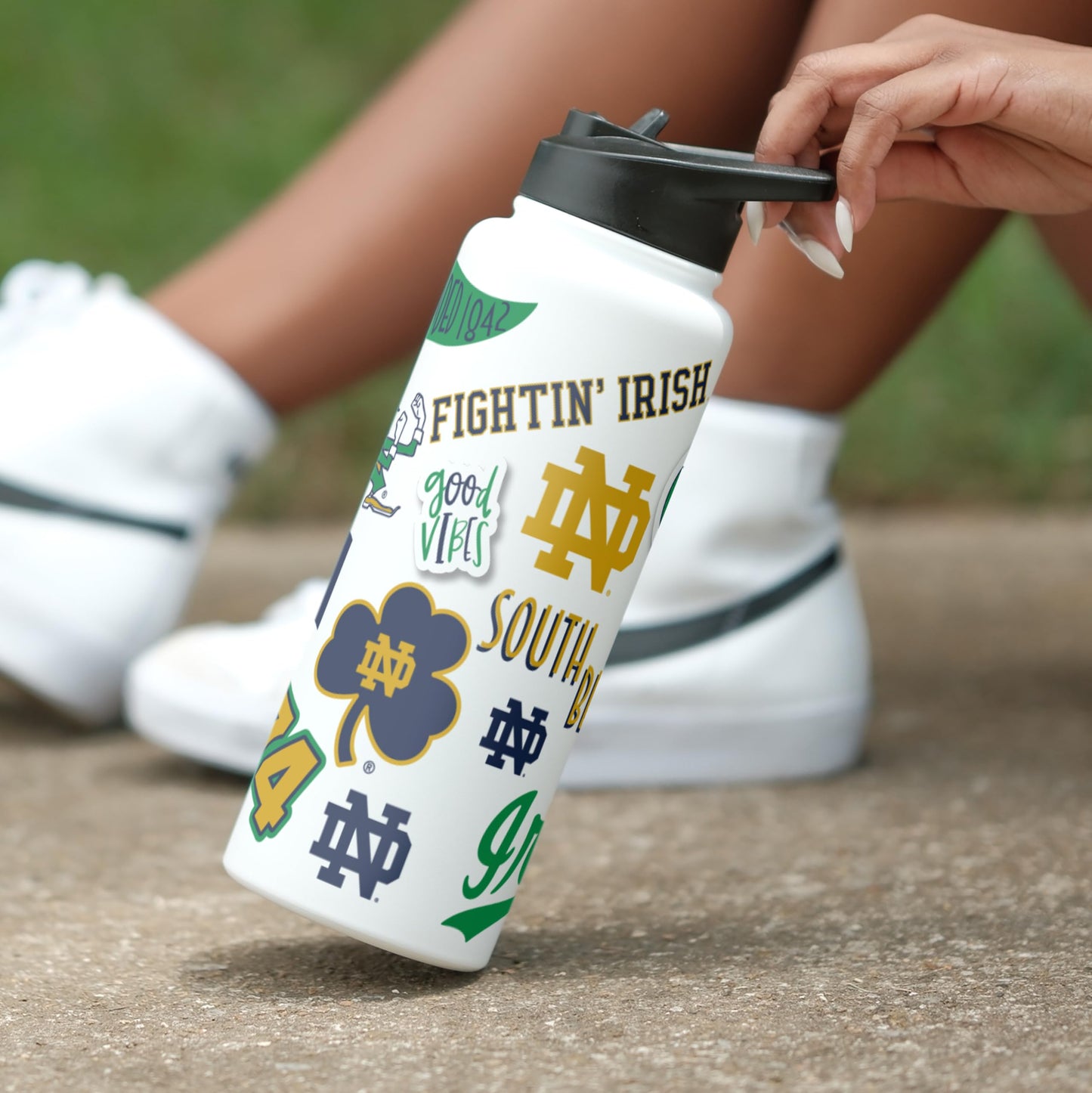 Logo Brands NCAA Notre Dame Fighting Irish Native 34 oz Quencher Water Bottle -All-Over Campus & Local Icons Design, Double-Wall Insulated to Keep