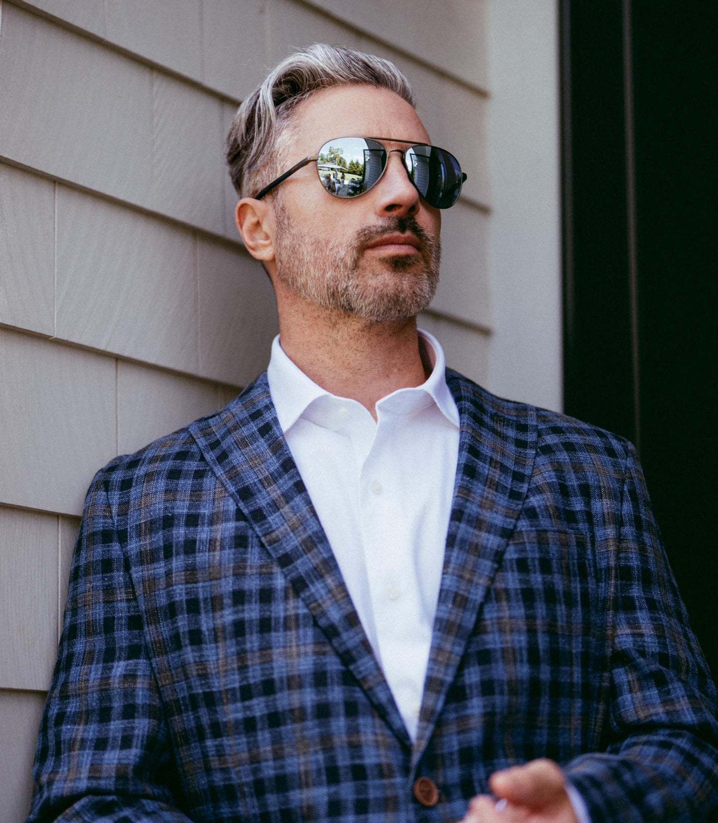 Revo Sunglasses Raconteur II: Polarized Lens with Metal Aviator Frame, Matte Gunmetal Frame with Blue Water Lens