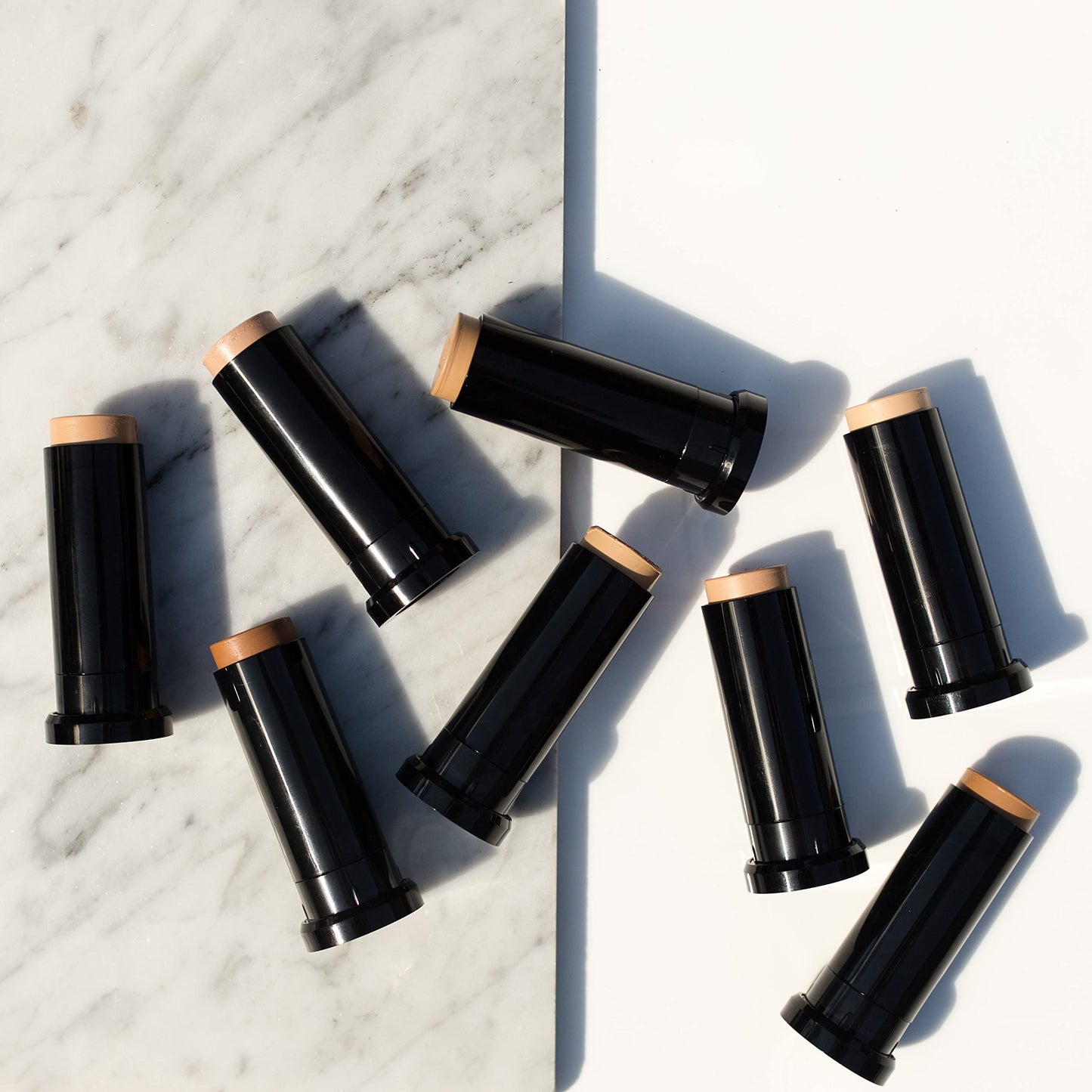 KRISTOFER BUCKLE Triplicity® Perfecting Foundation Stick, 0.4 oz. | Primes Skin, Provides Buildable Coverage & Has A Soft-Focus Effect | Tan