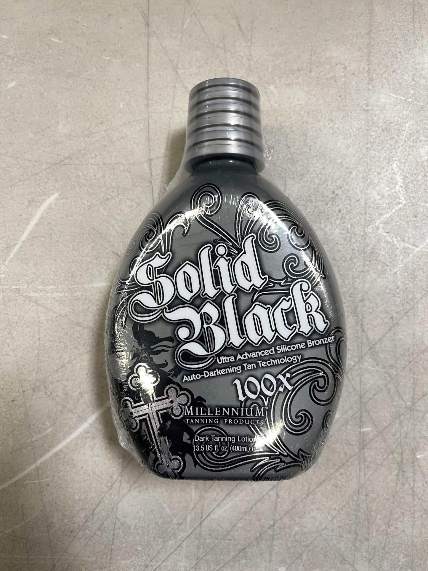Millennium Tanning Solid Black 100X Indoor Tanning Lotion for Tanning Beds (13.5 Fluid Ounces)