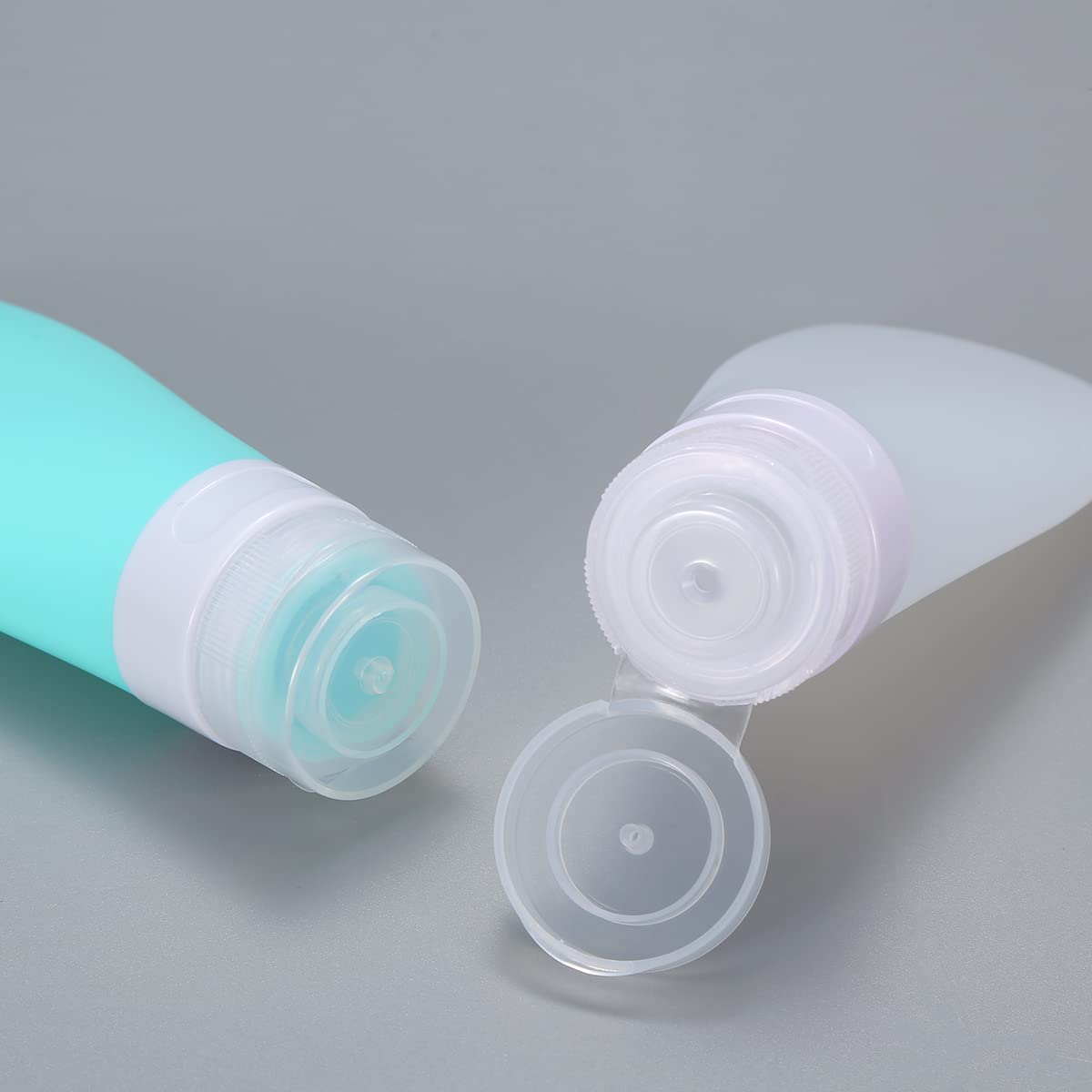 2 Pcs Silicone Travel Bottles,1.3oz Leak Proof Refillable Squeeze Containers with Transparent Carry Bag,Small Empty Travel Size Bottles