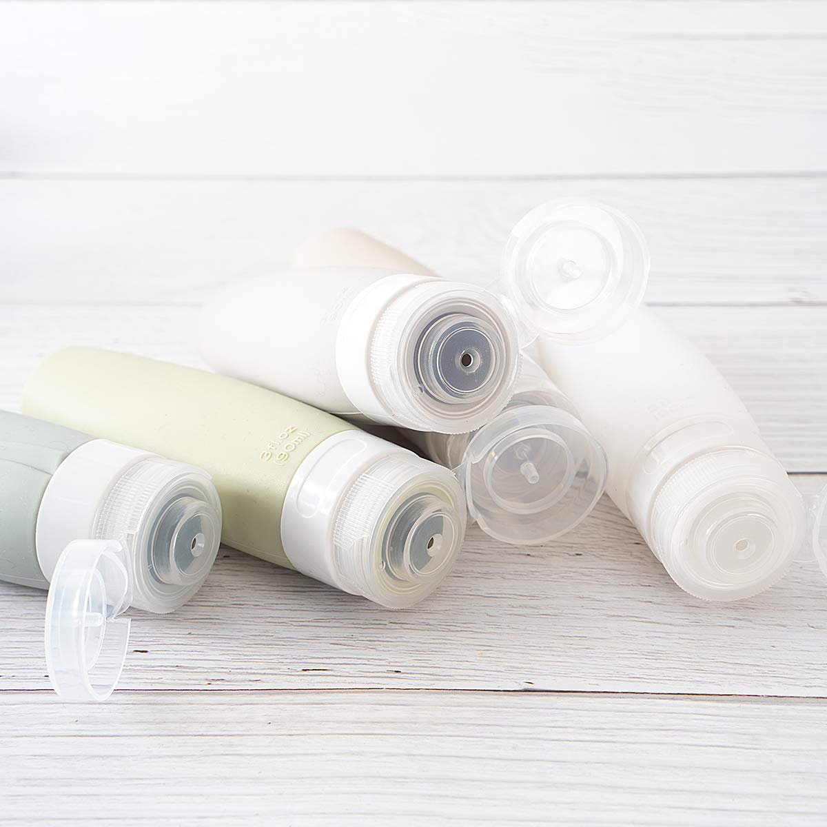 TSA Certified Portable Silicone Travel Bottle Set, Leak Proof Squeezable Silicon Tubes Travel Size Toiletries Containers, Refillable Travel