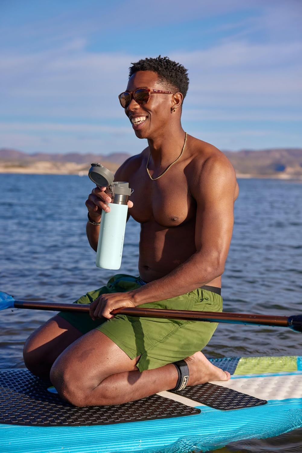 Stanley Quick Flip GO Water Bottle 24 oz | Push Button Lid | Leakproof and Packable for Travel and Sports | Insulated Stainless Steel | BPA-Free