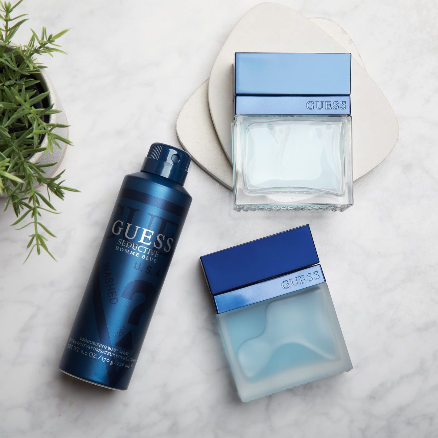 Guess Seductive Blue Men / Homme Eau de Toilette 4 Piece Gift Set - Cologne Spray 3.4 Fl. Oz., Deodorizing Body Spray 6.0 Oz., Shower Gel 3.4 Fl. Oz.