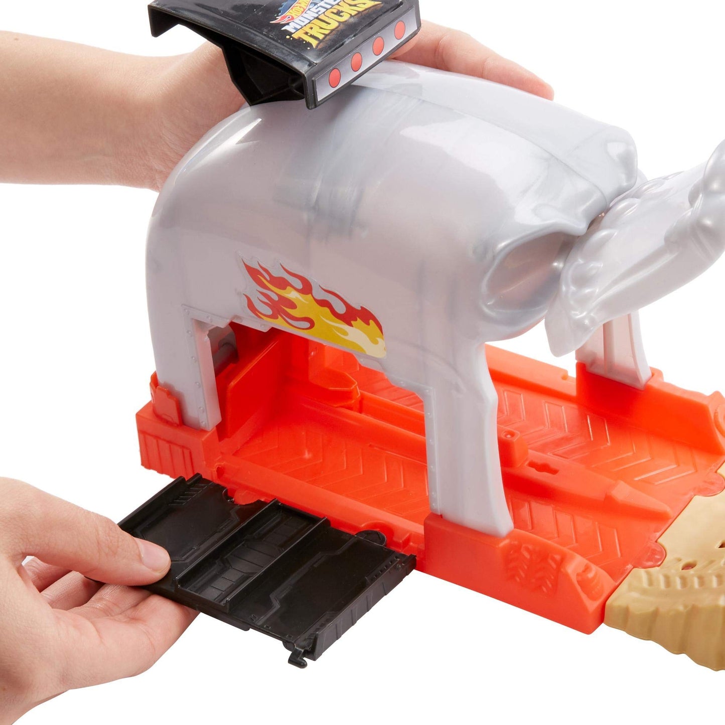 Hot Wheels Monster Truck Pit & Launch Play Sets with a Monster Truck and a 1:64 car, Team Bone Shaker, Multicolor