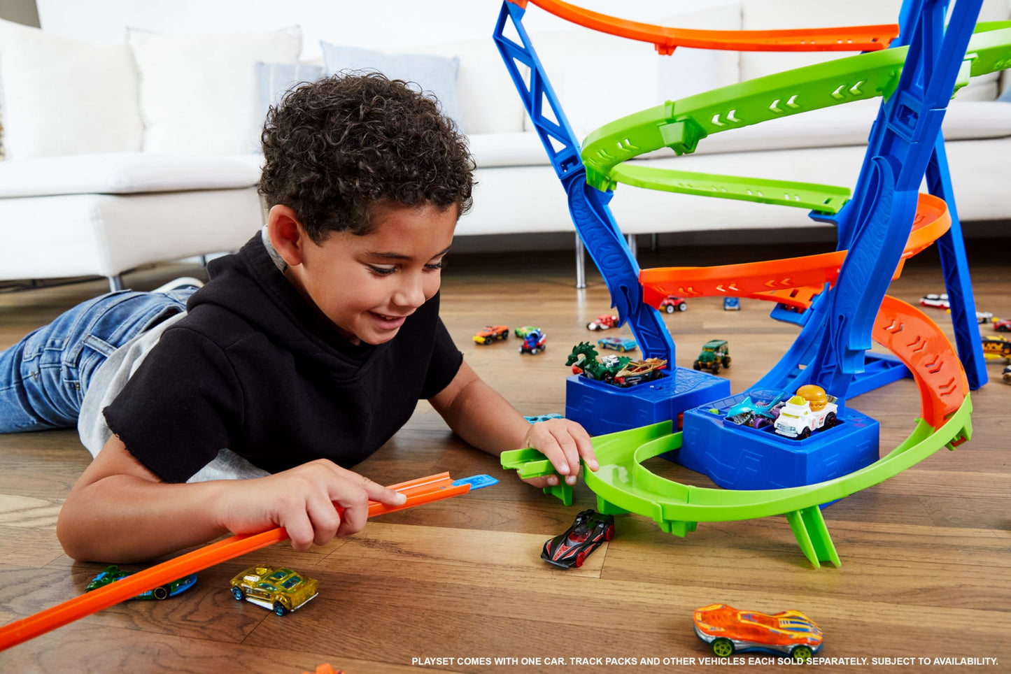 Hot Wheels Toy Car Track Set Spiral Speed Crash, Powered by Motorized Booster 29-in Tall Track with 1:64 Scale Toy Car