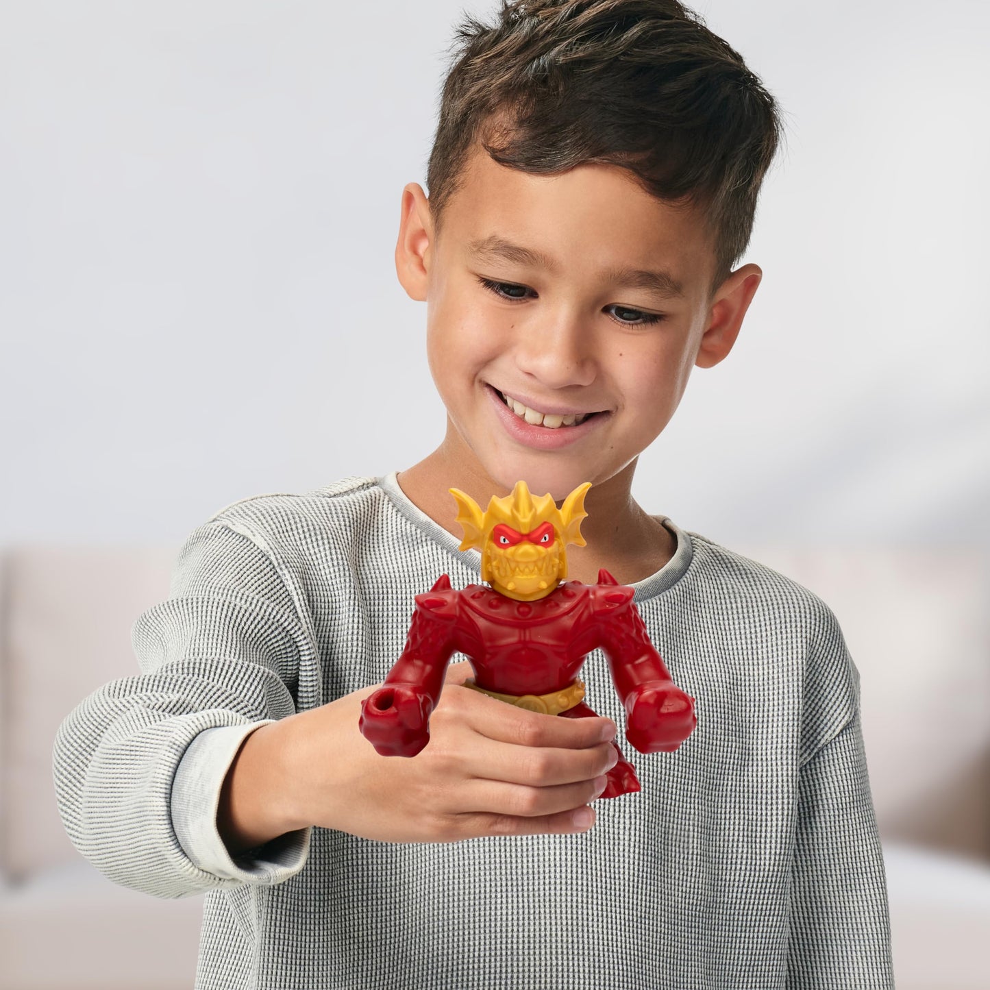 Heroes of Goo Jit Zu Stretch Strikers Blazagon – Stretchy Action Figure with Unique Goo Filling, Stretches 3X Size, Squishy Collectible Toy