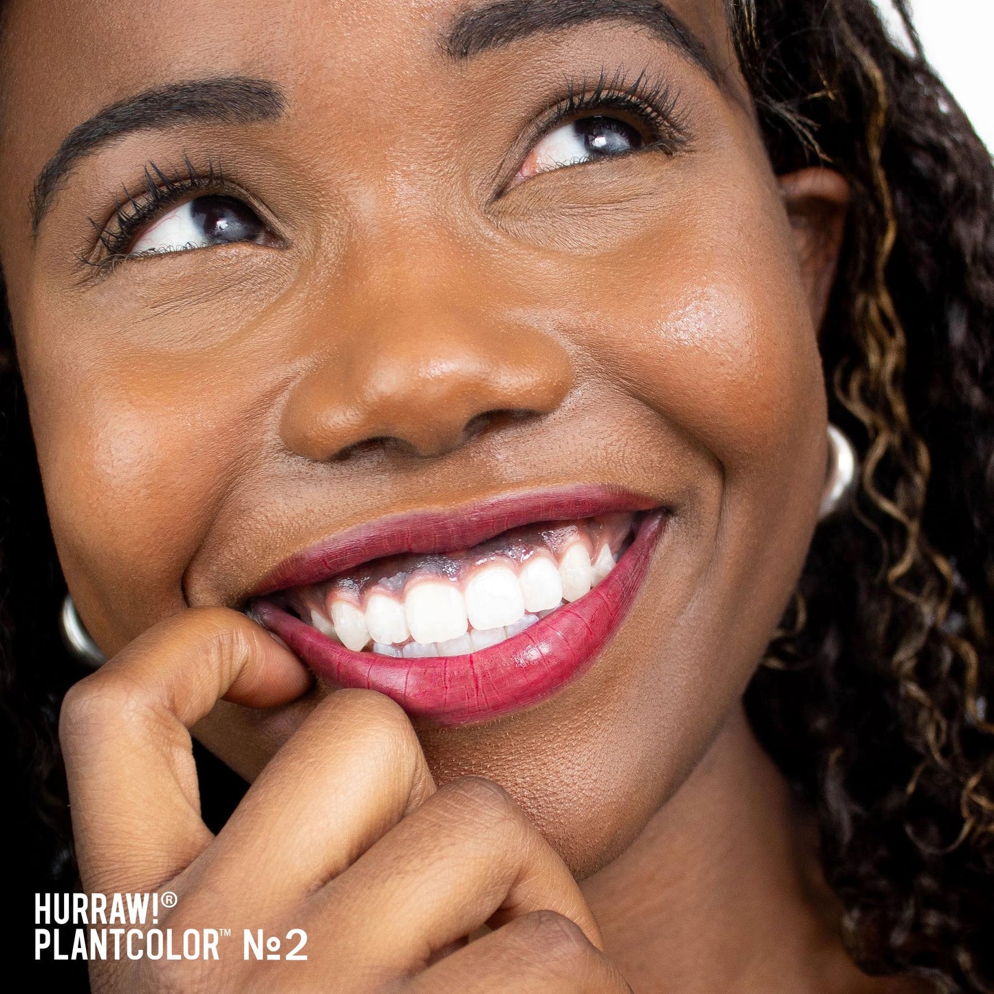 Hurraw! Plantcolor Lip Color No. 2: Red/Purple shade. Highly pigmented tinted balm and lipstick alternative. Vegan and all-natural. Easy application.